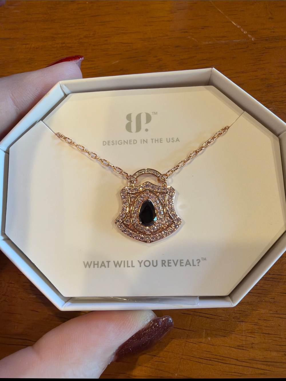 Rose Gold Shield Pendant Necklace with Black Teardrop Stone